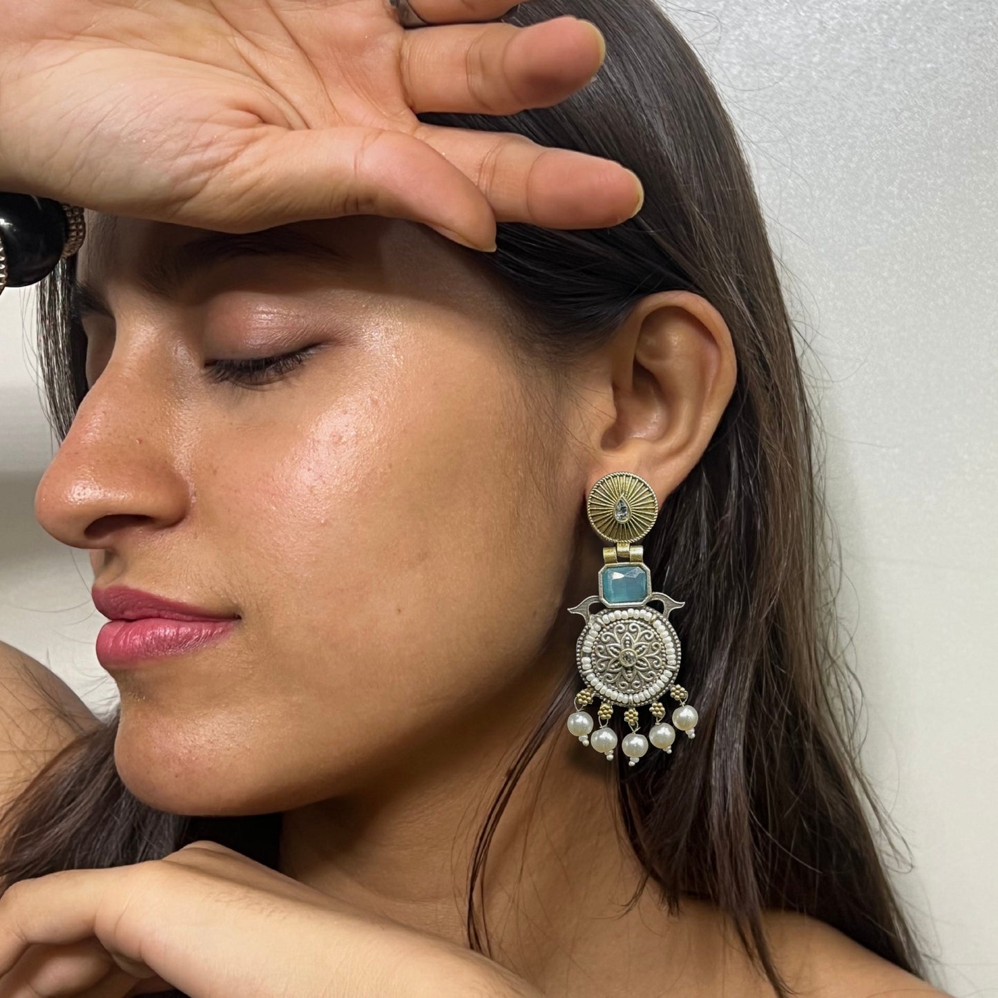 Saaj Rajvi Silver and Golden Earrings